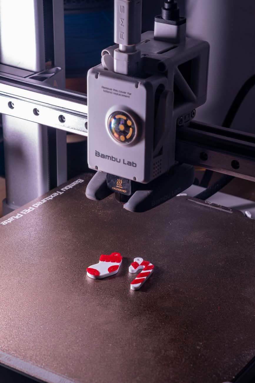 Colorful 3D printed PLA objects lifestyle 4K